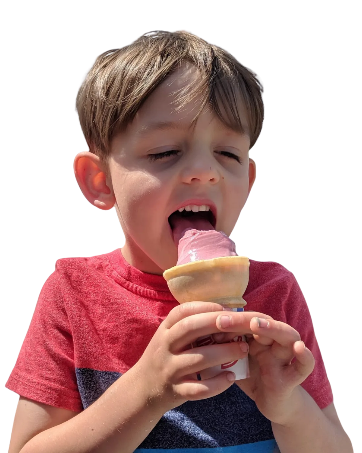 Child enjoying a hand-scooped ice cream cone